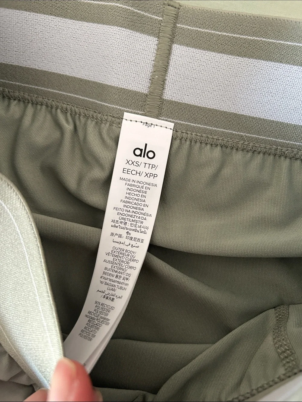 ALO Yoga match point tennis skirt in dune grass color